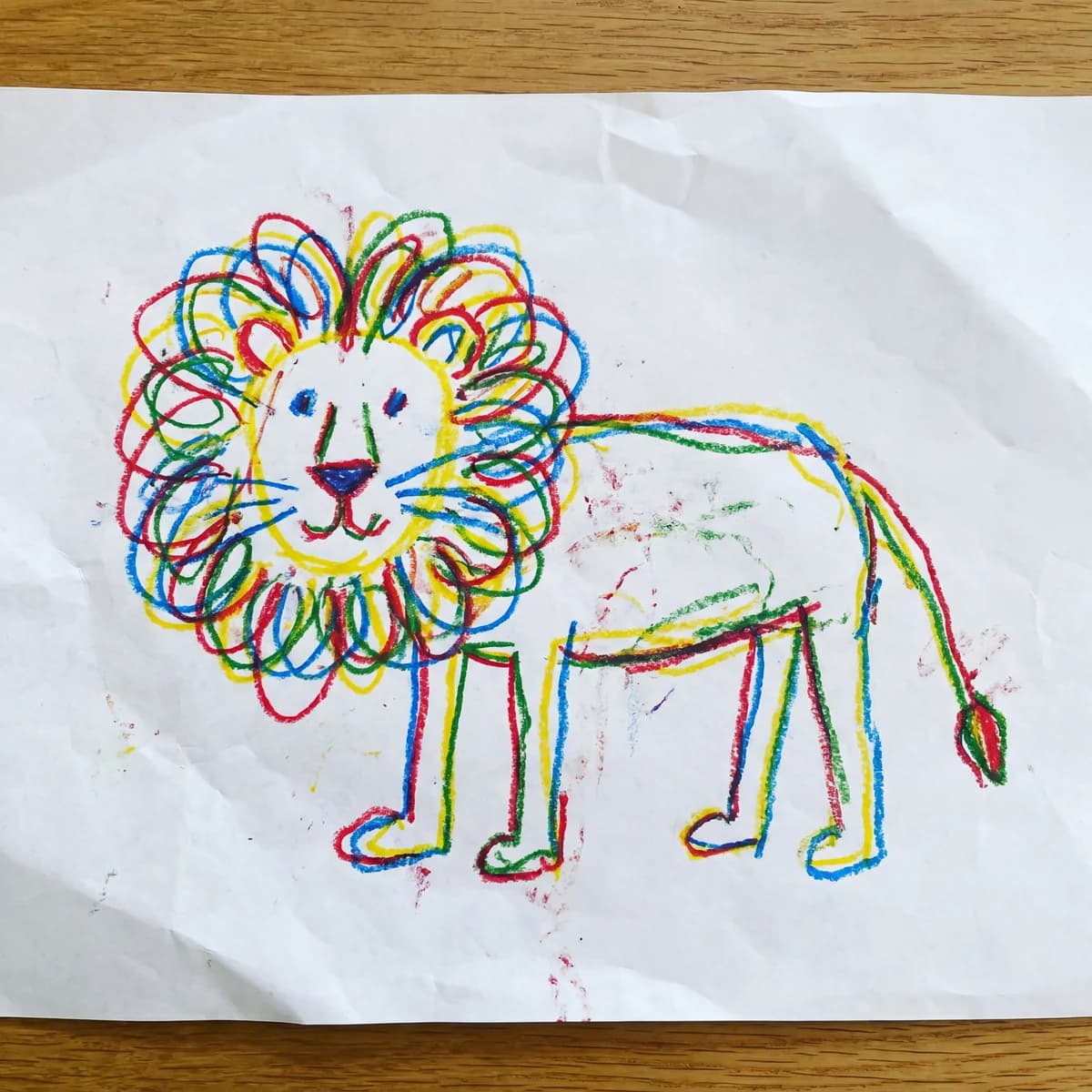 Child's wax crayon animal drawing drawing on white paper, the kind PrintCraftMan turns into a UV-printed LED night light keepsake for uncle.